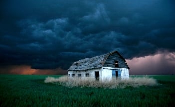 A white barn in the storm